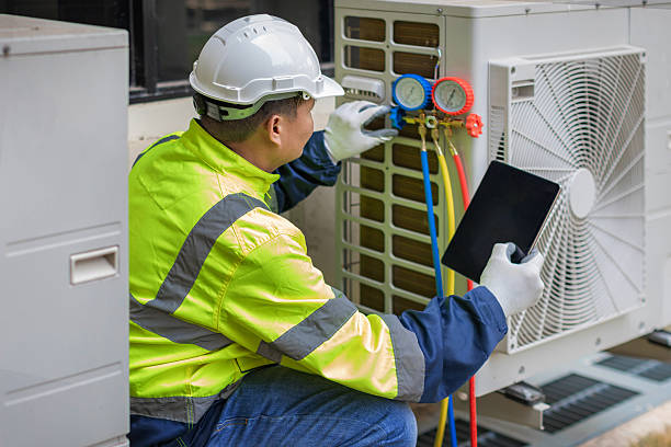 Professional Air Duct Cleaning technician working in Brighton, TN